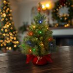 2 ft. Pre-Lit Majestic Fir Tree with Multicolor LED Lights, Red Base - Image 2